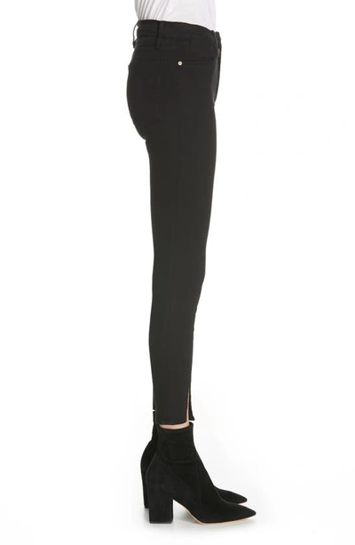 Shop Frame Le High Skinny Front Split High Waist Jeans In Film Noir