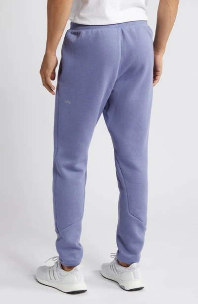 Shop Alo Yoga Triumph Sweatpants In Infinity Blue