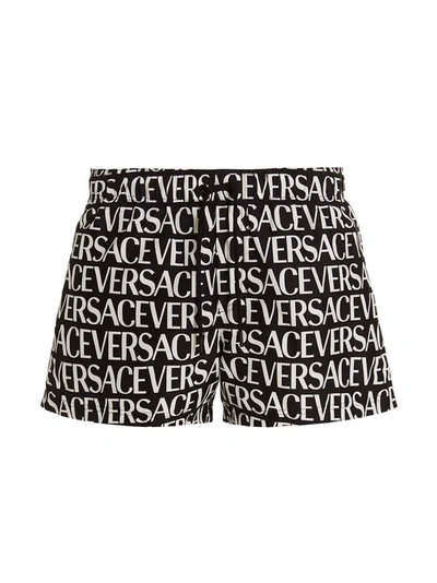 Shop Versace Logomania Beachwear White/black
