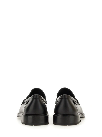 Shop Moschino Leather Loafer In Black
