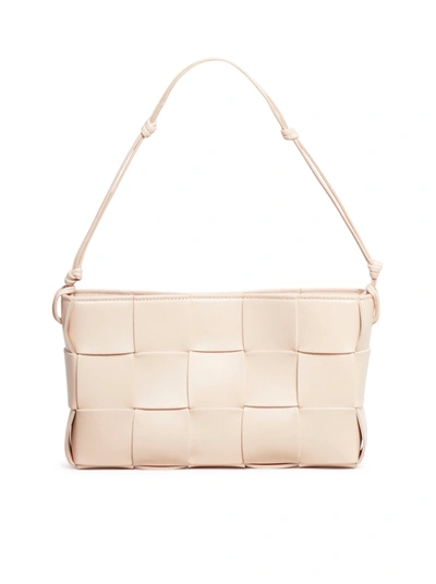 Shop Bottega Veneta Cassette Pouch On Strap Leather Shoulder Bag In Nude & Neutrals