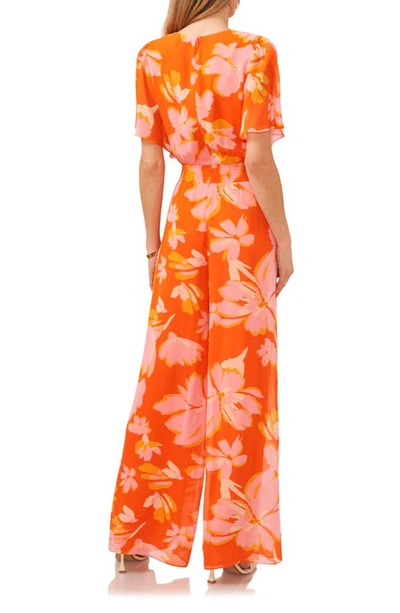 Shop Vince Camuto Floral Print Wide Leg Chiffon Jumpsuit In Orange Multi