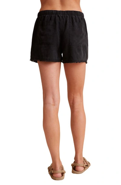 Bella Dahl Frayed Hem Pocket Shorts In Endless Sea In Vintage Black
