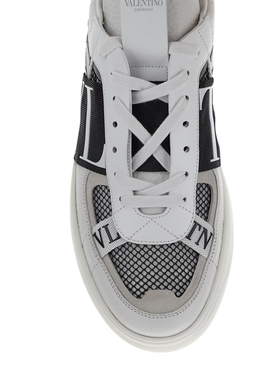 Shop Valentino Vltn Sneakers In White