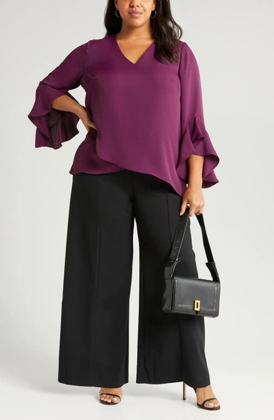 Shop Vince Camuto Flutter Sleeve Crossover Georgette Tunic Top In Pickled Beet