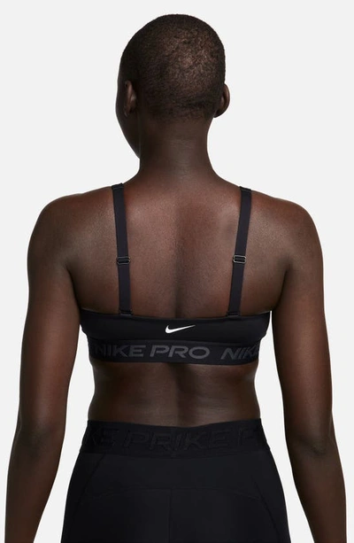 Shop Nike Indy Sports Bra In Black/ Anthracite/ White