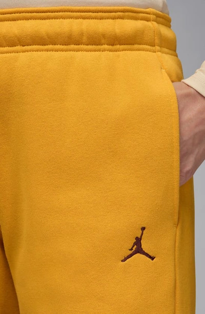 Shop Jordan Brooklyn Fleece Sweatpants In Yellow Ochre/ Dusty Peach