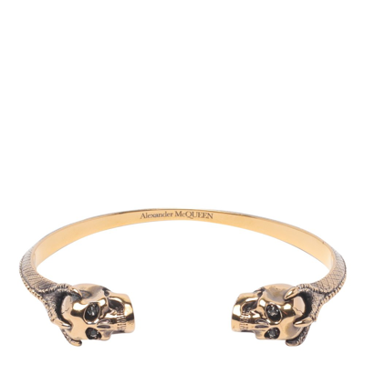 Shop Alexander Mcqueen Skull Embellished Cuff Bracelet In Gold