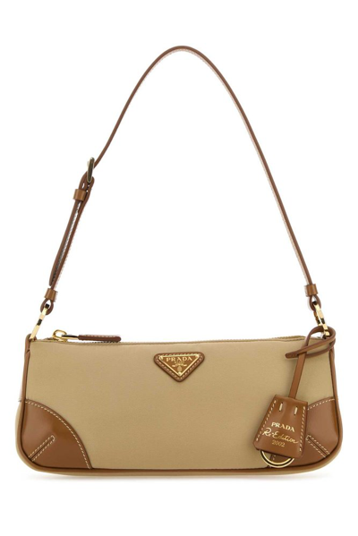Shop Prada Triangle Logo Plaque Shoulder Bag In Brown