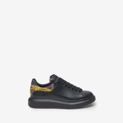 Shop Alexander Mcqueen Oversized Sneaker In Black/ Gold