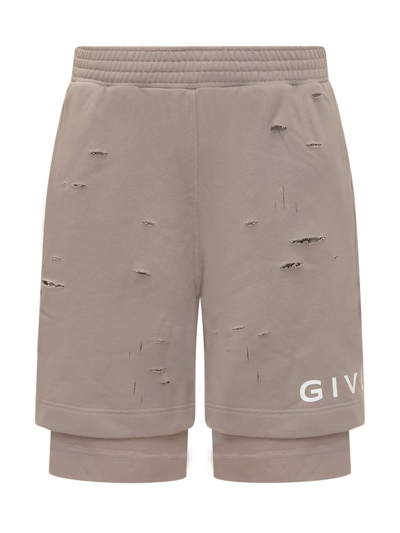 Shop Givenchy Destroyed Effect Bermuda Shorts In Beige