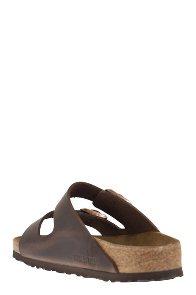 Shop Birkenstock Arizona - Flat Sandal In Brown