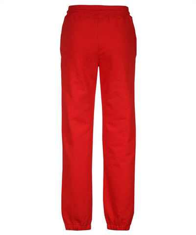 Shop Msgm Logo Print Sweatpants In Red