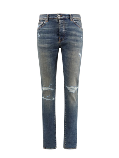 Shop Amiri Logo Detailed Distressed Skinny Jeans In Blue