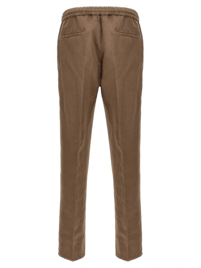 Shop Brunello Cucinelli Linen Blend Trousers In Brown