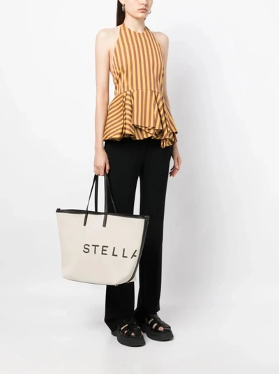 Shop Stella Mccartney Beige Logo Print Tote Bag In Neutrals