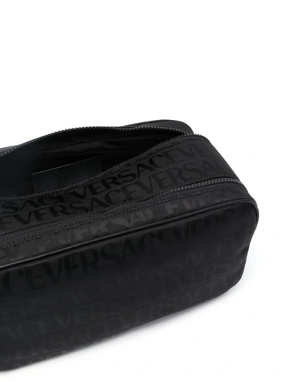 Shop Versace Allover Black Bag
