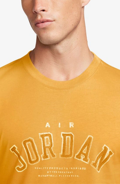 Shop Jordan Flight Essentials Graphic T-shirt In Ochre/ Black/ Sail