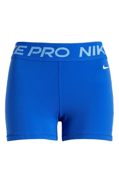 Shop Nike Pro Dri-fit Mid Rise Training Shorts In Hyper Royal/ University Blue