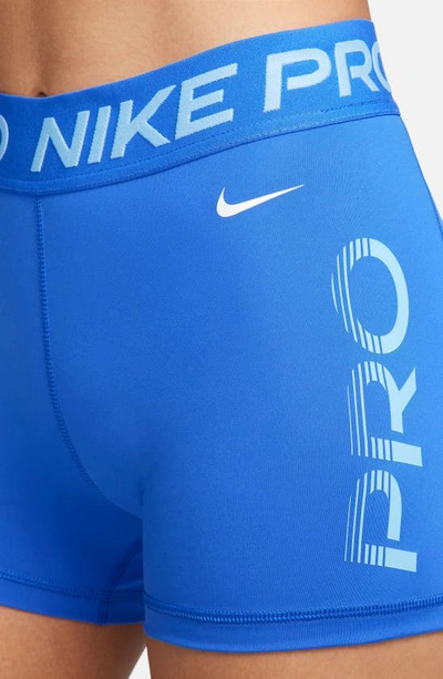 Shop Nike Pro Dri-fit Mid Rise Training Shorts In Hyper Royal/ University Blue