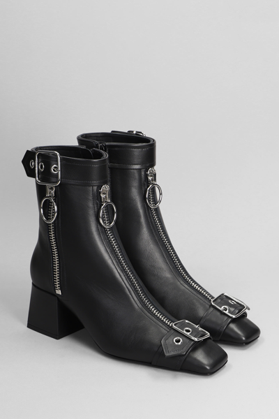 Shop Courrèges Low Heels Ankle Boots In Black Leather