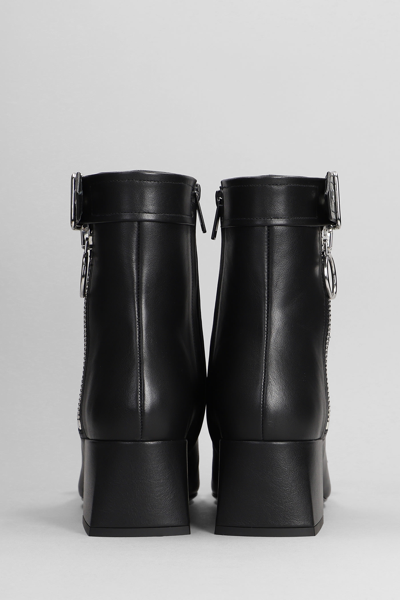 Shop Courrèges Low Heels Ankle Boots In Black Leather