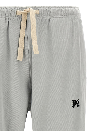 Shop Palm Angels Monogram Travel Pants In Gray