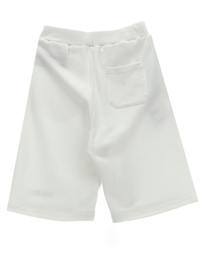 Shop Balmain Logo Print Bermuda Shorts In White/black