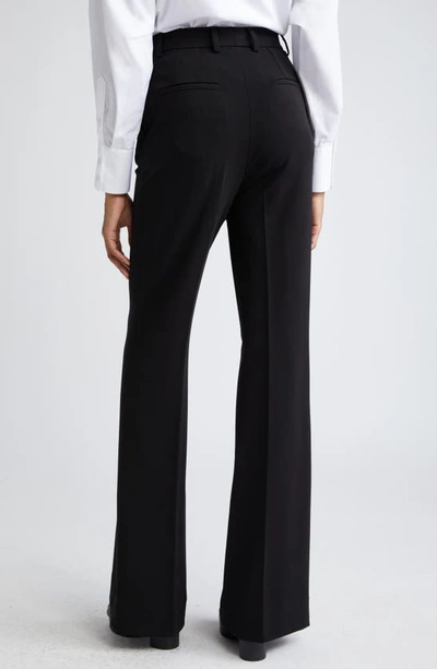 Shop Dolce & Gabbana Knit Flare Leg Trousers In N0000nero