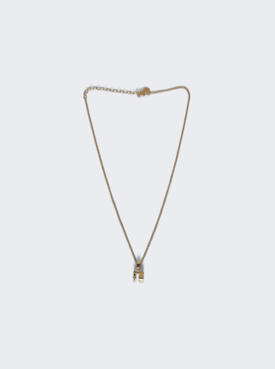 Shop Ivi Slot Charm Necklace In Yellow Gold And Emerald