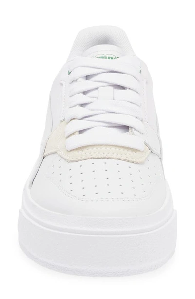 Shop Puma Cali Court Match Platform Sneaker In  White-archive Green
