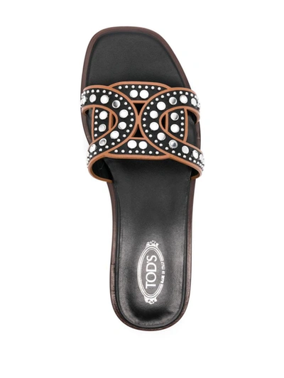 Shop Tod's Leather Flat Sandals In Black