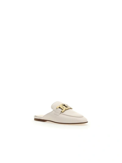 Shop Tod's Mules In Bianco