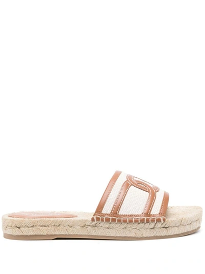 Shop Tod's Rafia And Leather Flat Sandals In Beige