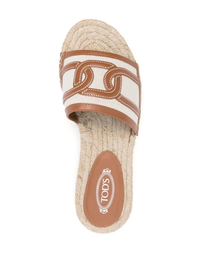 Shop Tod's Rafia And Leather Flat Sandals In Beige