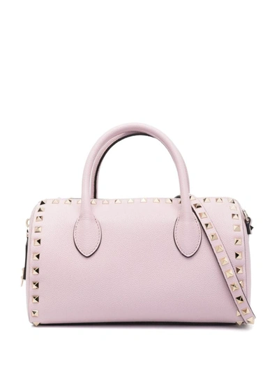 Shop Valentino Garavani Rockstud Leather Bowling Bag In Lilac