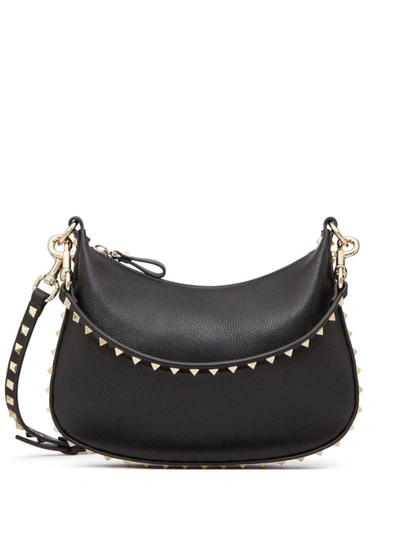 Shop Valentino Garavani Rockstud Small Leather Hobo Bag In Black