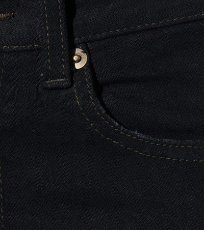Shop Saint Laurent Distressed Skinny Jeans In Llack Overdye Llue