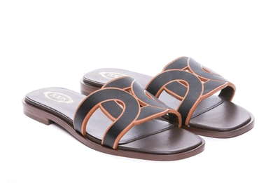 Shop Tod's Sandals In Black