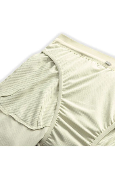 Shop Nike Dri-fit Stride 5-inch Running Shorts In Olive Aura/ Dark Stucco