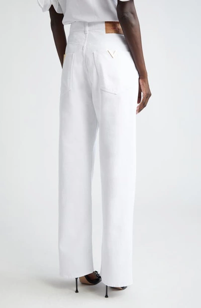 Shop Valentino V Pocket Denim Jeans In Bianco