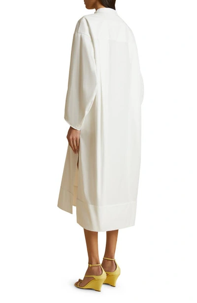 Shop Khaite The Brom Long Sleeve Cotton Midi Dress In White
