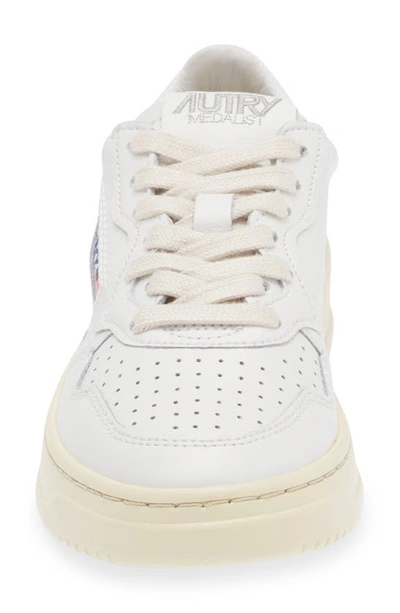 Shop Autry Medalist Low Sneaker In White/ White