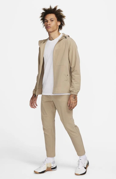 Shop Nike Dri-fit Unlimited Drawstring Pants In Khaki/ Black/ Khaki