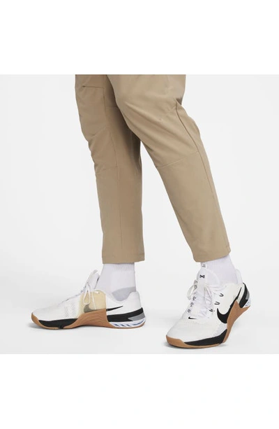Shop Nike Dri-fit Unlimited Drawstring Pants In Khaki/ Black/ Khaki