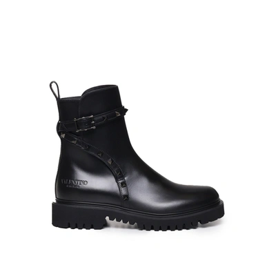 Shop Valentino Rockstud Combat Boots In Black