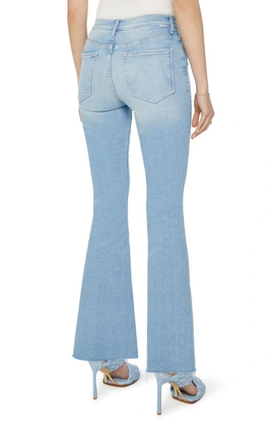 Shop Mother The Weekend Fray Hem Bootcut Jeans In California Cruiser