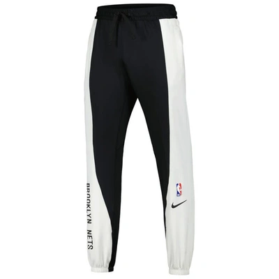 Shop Nike Black/white Brooklyn Nets 2023/24 Authentic Showtime Pants