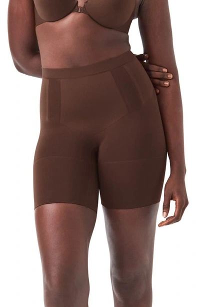 Shop Spanx Oncore Mid Thigh Shorts In Chestnut Brown