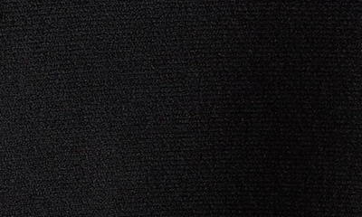 Shop Balmain Crystal Button Peplum Rib Cardigan In Black